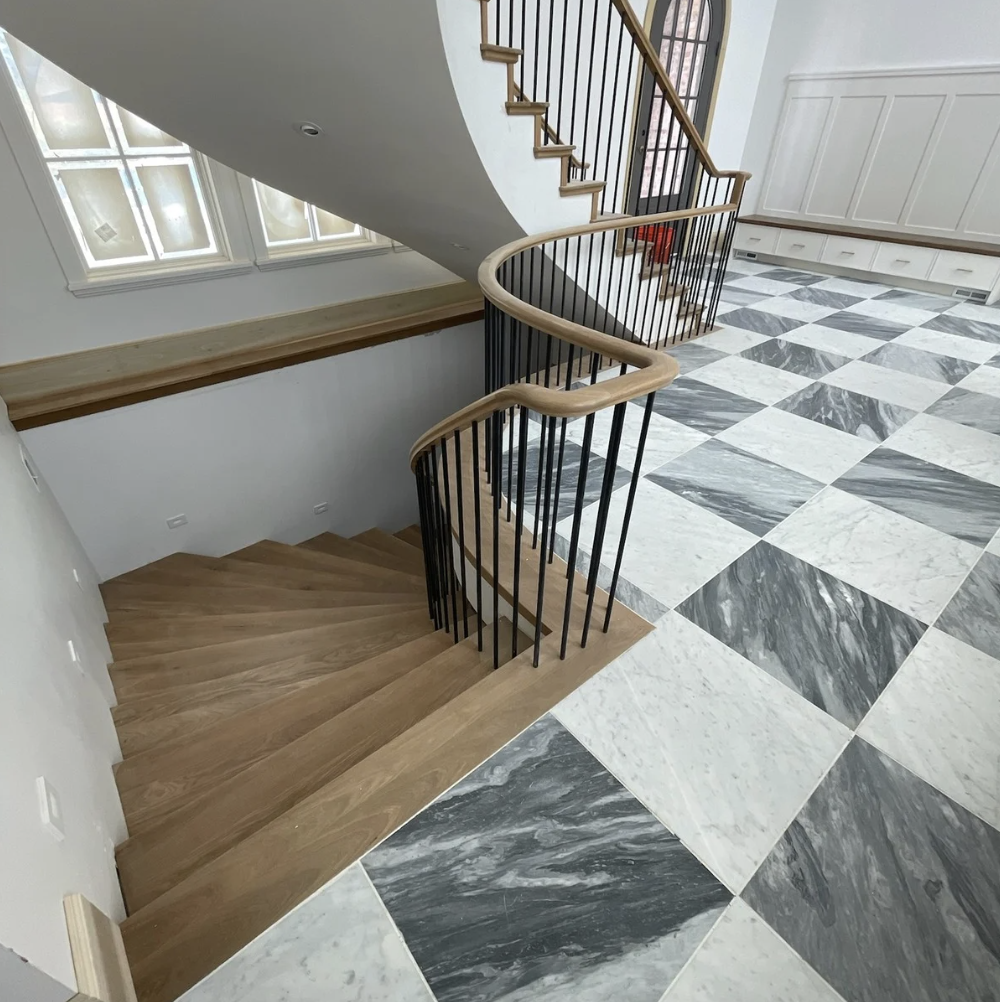 Finished basement remodel with custom flooring — Pine River Construction Utah
